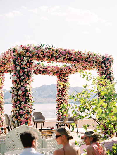 An elaborate pink floral installation for a wedding