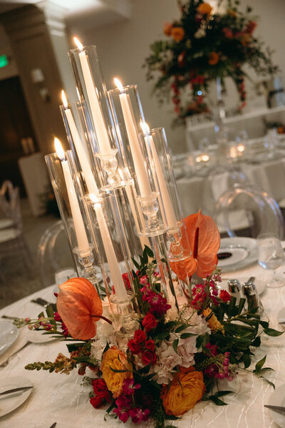 Naples Wedding Photography of floral and candle details Captured by Priscila Del Cristo.