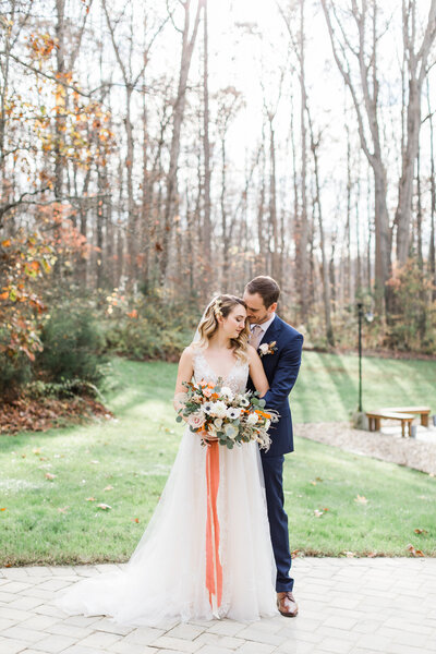navy blue and terracotta bride and groom portraits