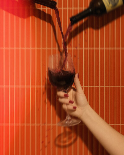 Runners group running on road facing camera