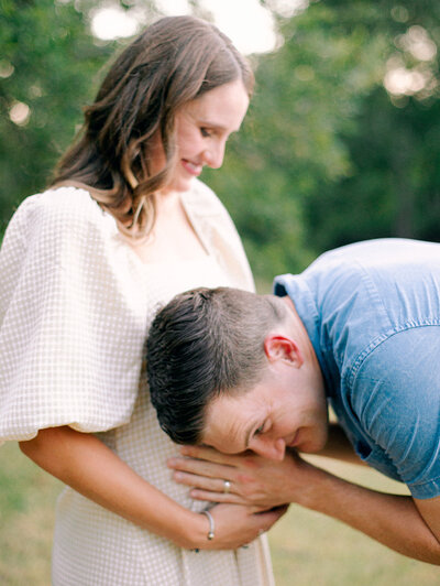 Intimate motherhood session photographed in Maine with film and digital.