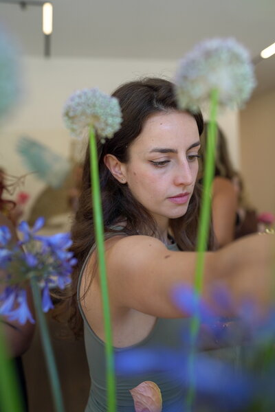 Woman at a flower making workshop