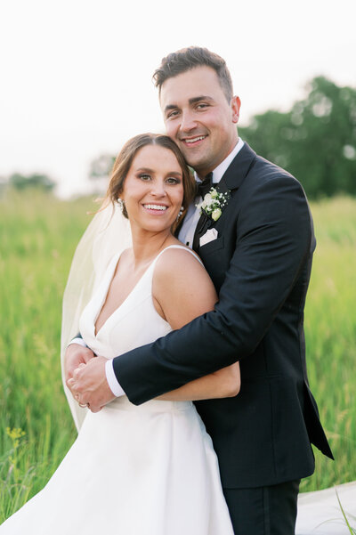 Bride and groom cutting cake, taken by wedding photographers in minneapolis, Bauer creative