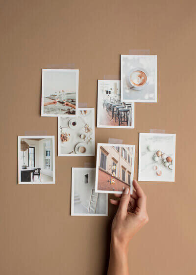copywriting for small businesses putting prints on a wall