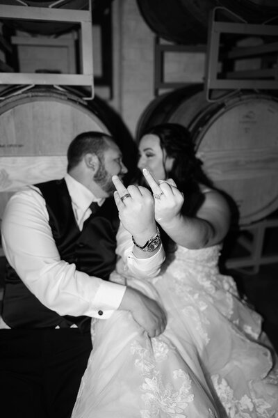 Bride and groom showing rings