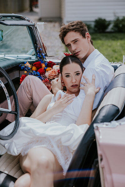 Destination Elopement Photographer captures bride and groom in car
