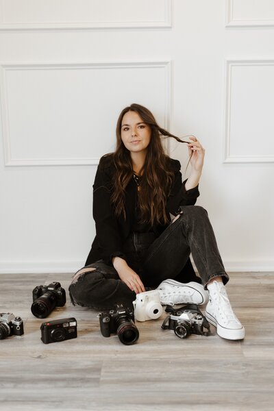Personal brand photography session in Fort Worth with small business owner smiling at camera