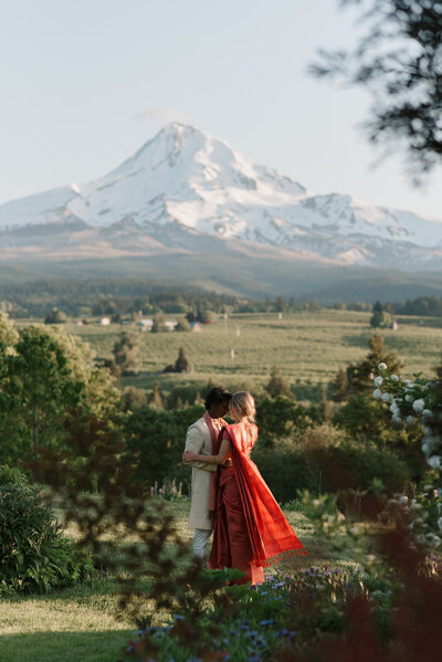 dramatic window shot of wedding couple