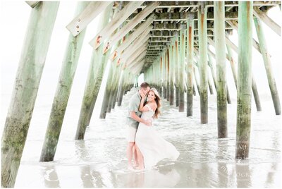 Couple kissing on the beach at the myrtle beach state park