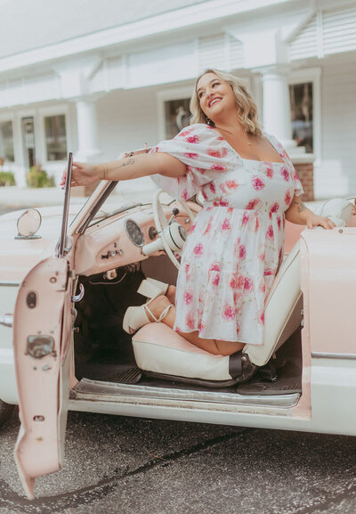 Iconic Lash founder and  Lash Artist Mentor Lea Love  poses near some water