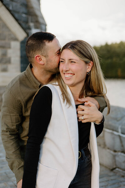 couple embracing at Barkhamsted reservoir in Connecticut