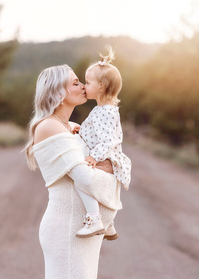 Fort Collins maternity photos featuring a serene outdoor lakeside location