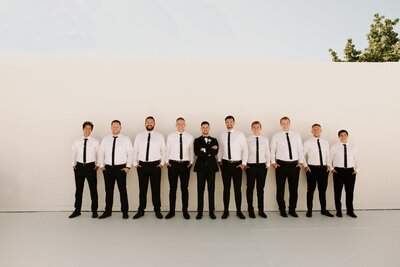 Groom & Groomsmen All Lined Up - Bre & Chris | Converted Basketball Court Wedding – Featured in Brides Magazine
