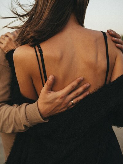 Man and woman holding eachother