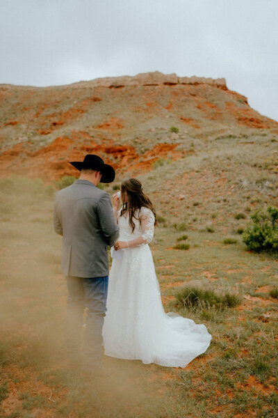 bride and groom share private vows captured by oklahoma wedding photographer