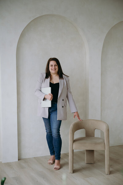 Portrait of Ottawa wedding and portrait photographer Stacy Kenopic, captured in natural light for personal branding