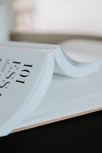 Book laying flat and halfway open