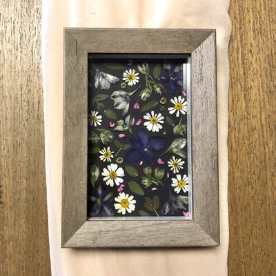 pressed frame dark background cropped