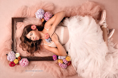 studio dance portrait covered in pink flowers by Brielle Pausma Photography in Munster Indiana.