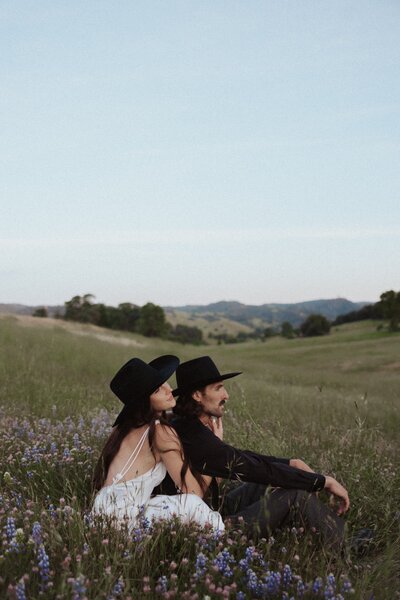 couples portraits in wildflower field