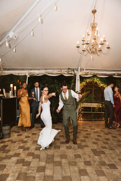 wedding reception party - swinger husband and wife - reception in downtown atlanta - weddings by kattie jackson 