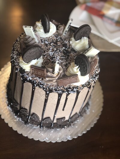 Two tier Butterfly Garden cake w by Artisan Buttercream.