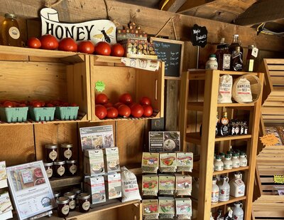 local farm produce, local honey, syrups  and jams on stands in Bascom Road farm store