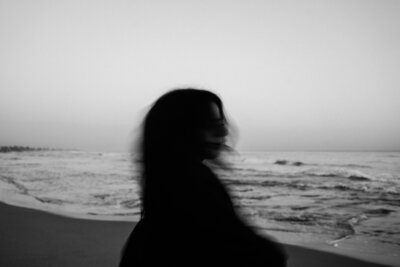 Woman posing on beach