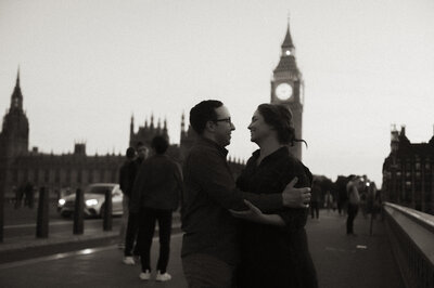 Couple in front of Big Ben during London engagement session, cinematic moody film & Super 8 photography