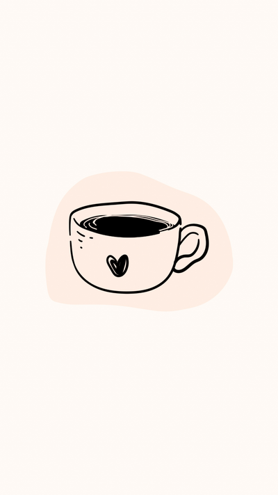 Eine Tasse mit einem Herz drauf gefüllt mit Kaffee
