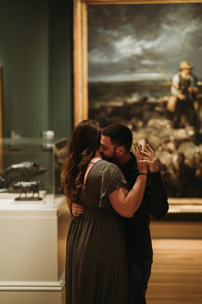 Couple at the Chrysler Museum for their engagement sessiion