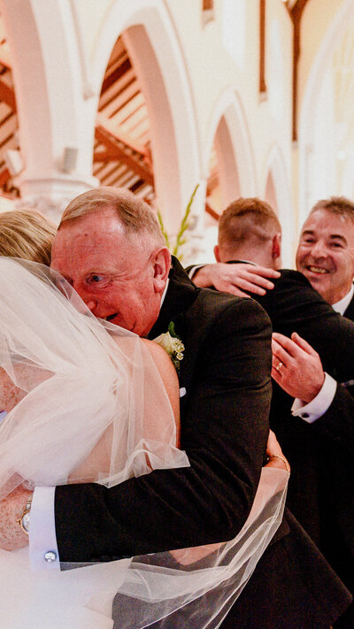 A beautifully composed documentary wedding shot by a top Waterford wedding photographer, highlighting the natural emotions and real moments of the day