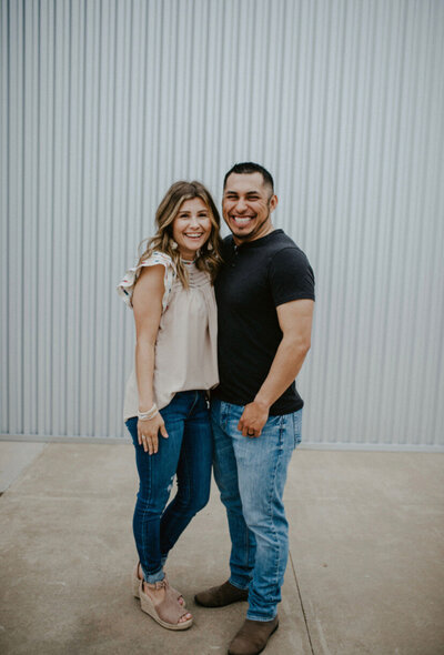 Cacey, a realtor at Capital Realty Group and her husband.
