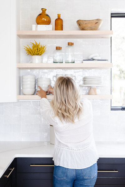 A professional photo of Caroline, the owner of Tidyish Home Organizing