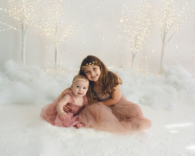 sisters in a white winter wonderland studio pictures