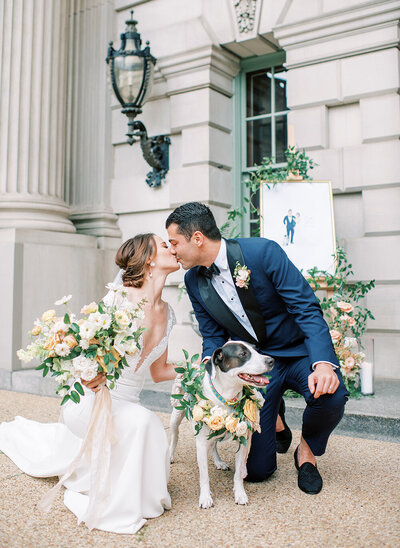 Groom giving the bride a kiss
