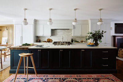 A custom kitchen design in a renovated Boston brownstone, blending historic charm with modern functionality and timeless details.