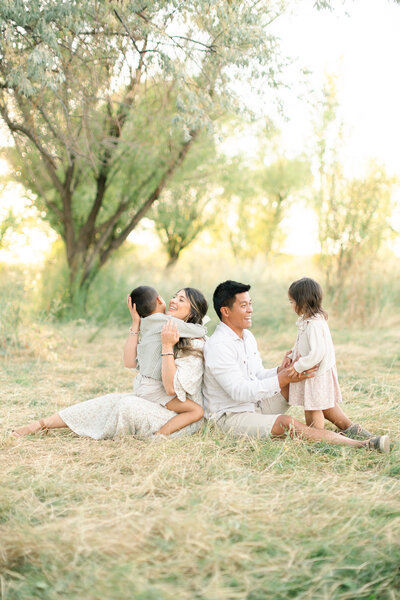 Natural light family photography in Utah, highlighting warm family connections, by Kamee Valdez Photo