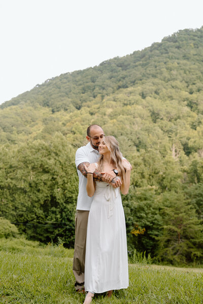 couple embracing in the mountains