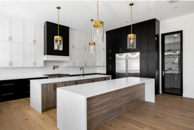 custom white cabinets. cabinet with gold hardware. white cabinets. white countertops. large island.