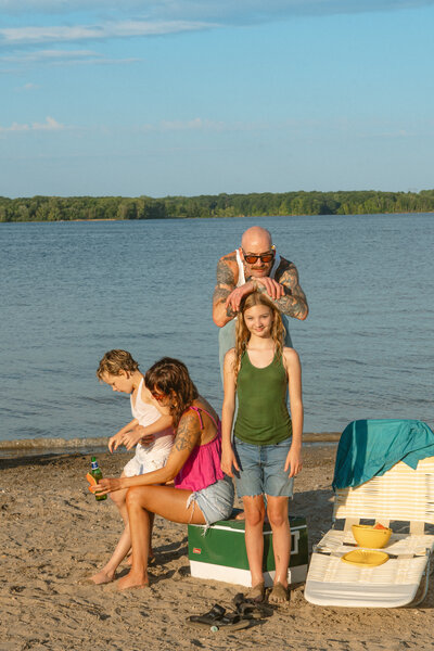 Family at beach on sunny day