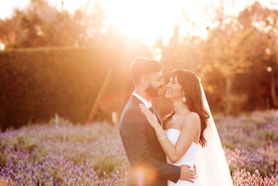 Bride holds up her bouquet at a Royal Palms in Phoenix, Arizona.