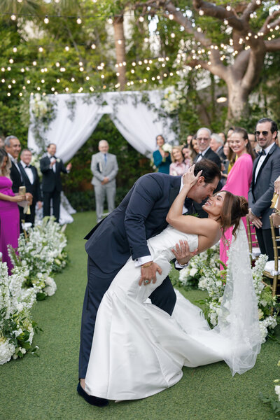 colony hotel wedding ceremony for Jaque and Aaron at east garden 