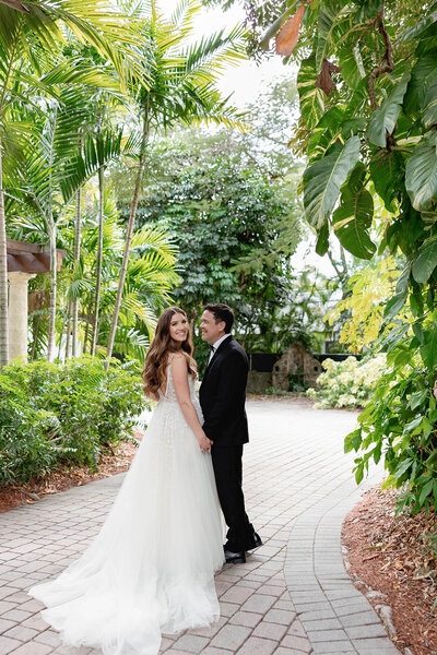 Bride and groom kiss at Villa Woodbine, captured by Claudia Amalia, a wedding and lifestyle photographer based in Miami and Florida Keys, South Florida. Destination weddings available. Portfolio highlight.