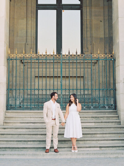 Bride and groom walk up memorial steps at their DC wedding