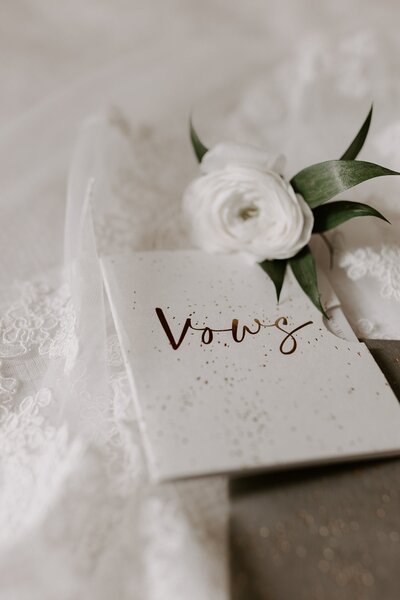 Vow book with white floral