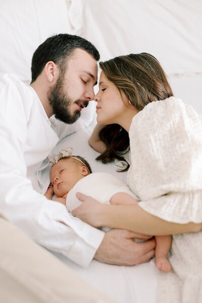 A loving moment caught on camera between mom, dad and baby at their beautiful home in Dallas, Texas.