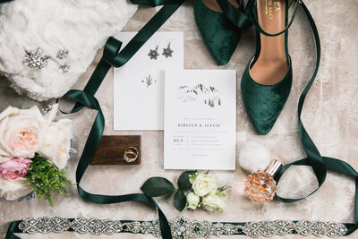 flatlay of shoes and other bridal pieces