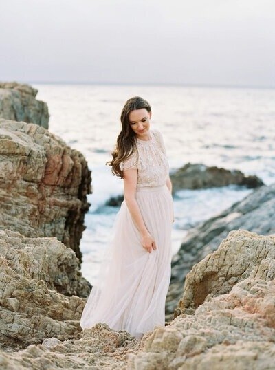one of the top maternity photographers in san francisco ca wearing a dress and posing