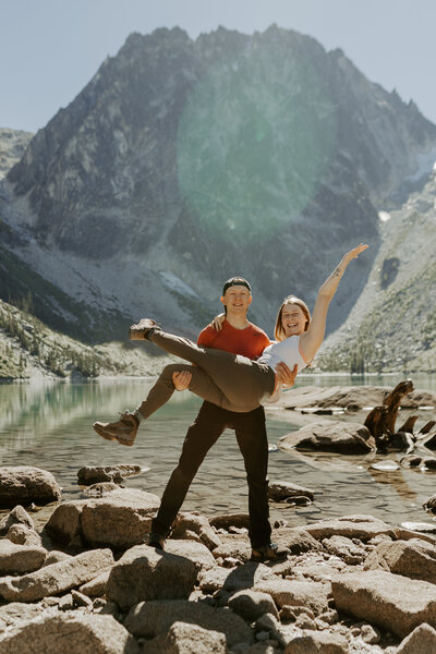 Hannah and Adam posing in front of Colchuck Lake